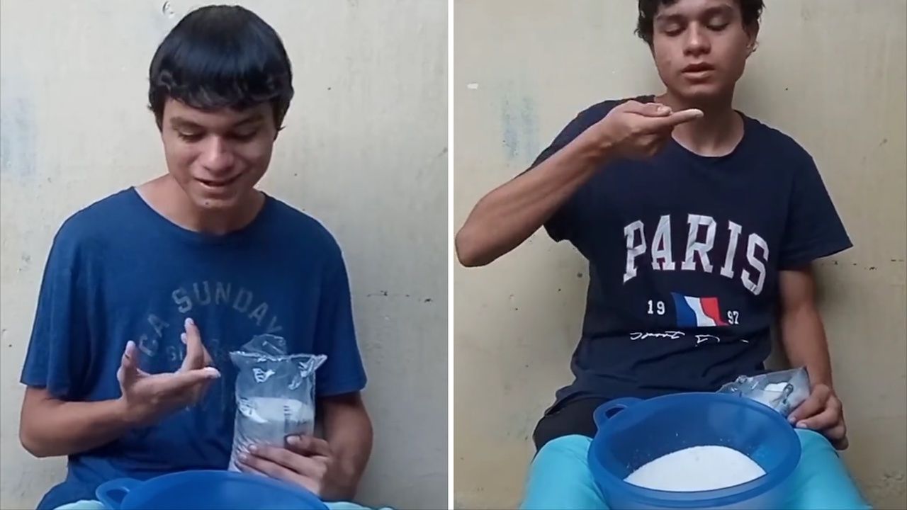 Joven cuenta los granos de azúcar en un kilogramo en video